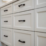White painted bathroom vanity cabinets