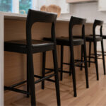 Quartersawn White Oak island cabinets stained in light brown Pampas finish.