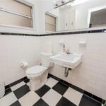 Before shot of the Master Elegance bathroom