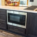 Dark stained kitchen island cabinets