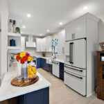 Blue and white painted kitchen cabinets