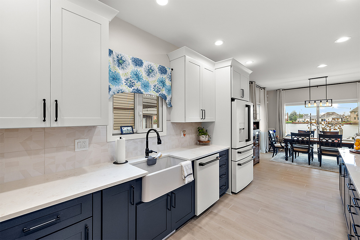 Blue and white painted kitchen cabinets
