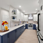 Blue and white painted kitchen cabinets