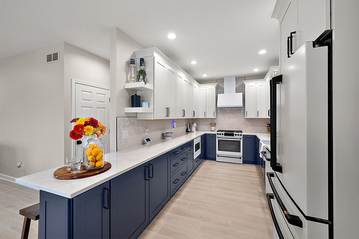 Blue and white painted kitchen cabinets