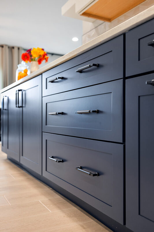 Blue and white painted kitchen cabinets
