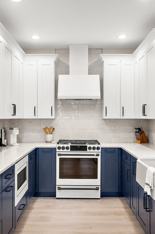 Blue and white painted kitchen cabinets