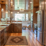 Rustic hickory kithen cabinets with brown stain