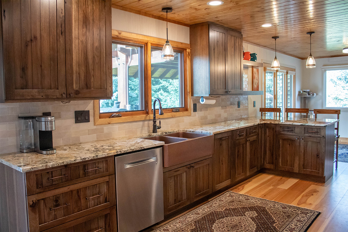 Rustic hickory kithen cabinets with brown stain