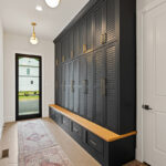 Dark stained mudroom storage cabinets