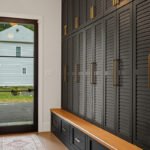Dark stained mudroom storage cabinets