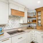Painted and stained kitchen cabinets.