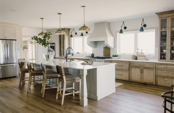 kitchen with painted island and stained perimeter.