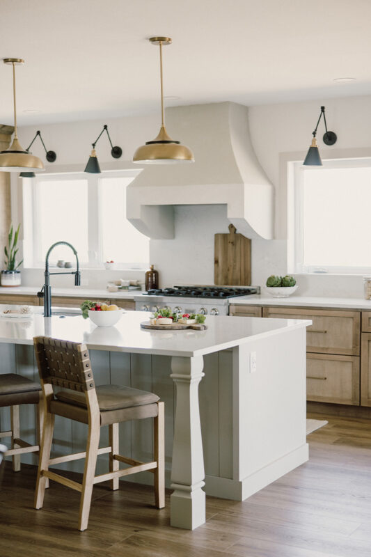 kitchen with painted island and stained perimeter.