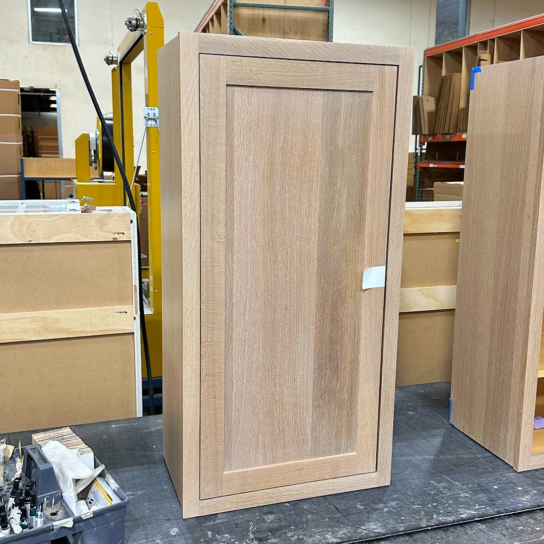 Standard wall cabinet in light stain on Quartersawn White Oak.