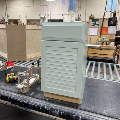 Standard base with slab header and slotted door in Frostwork paint