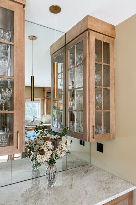 Cashew-stained kitchen perimeter cabinets.