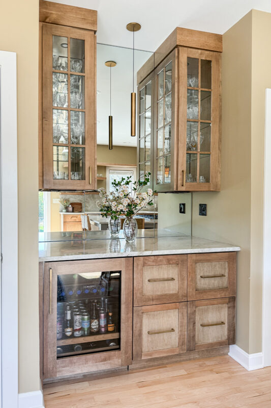 Cashew-stained kitchen perimeter cabinets.
