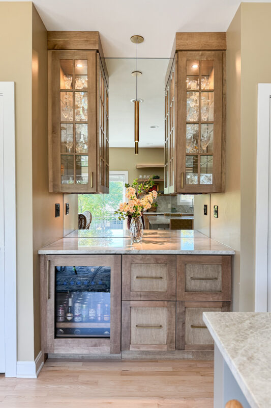 Cashew-stained kitchen perimeter cabinets.