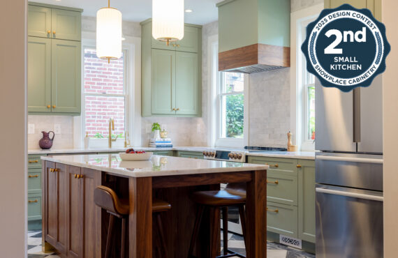 Painted kitchen perimeter cabinerts with walnut island.