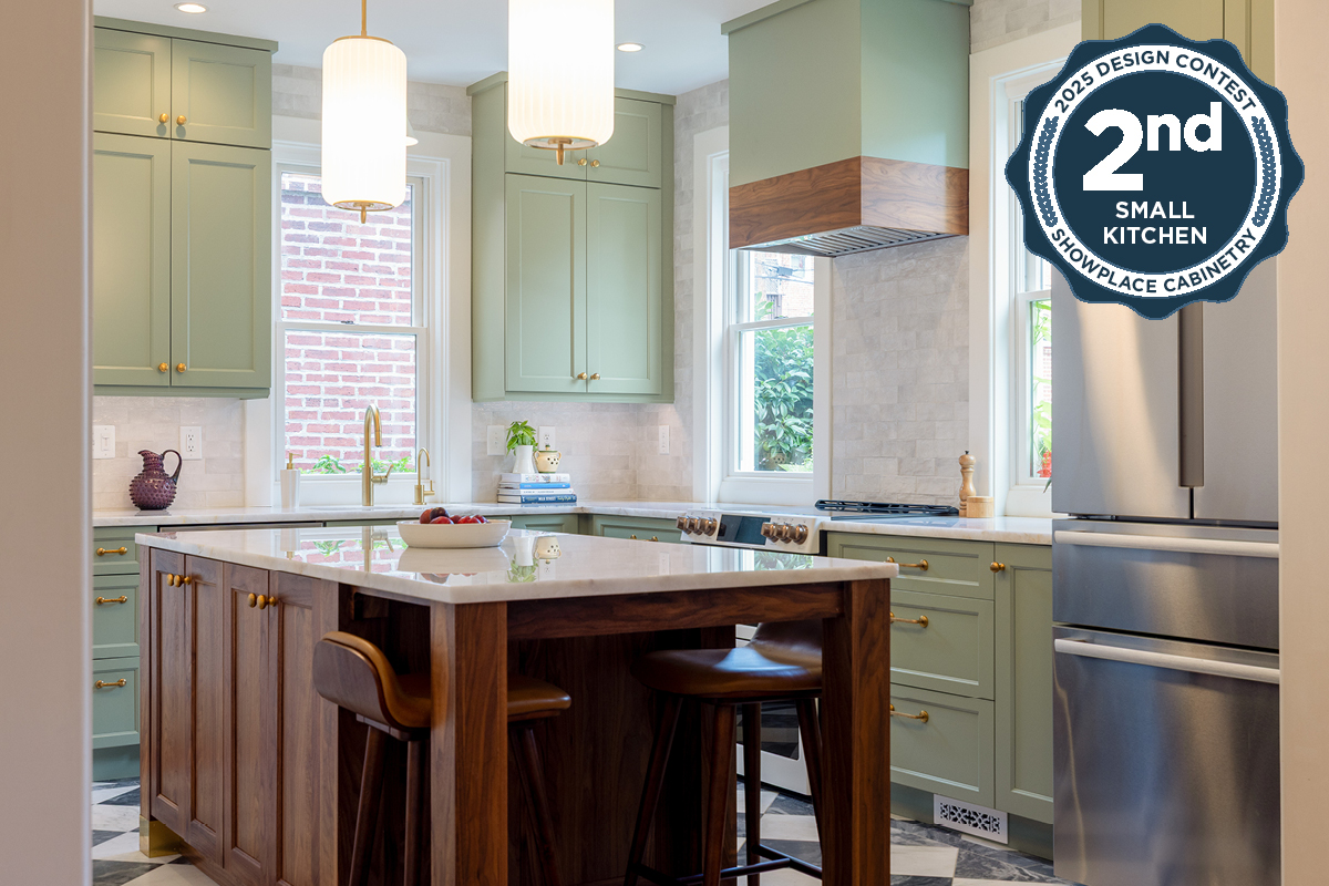 Painted kitchen perimeter cabinerts with walnut island.