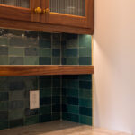 Walnut cabinet with glass doors