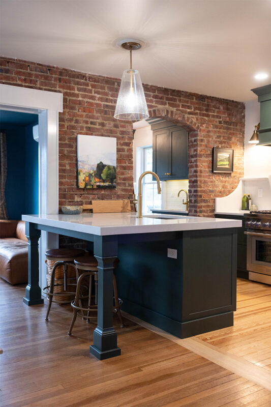 Purple painted kitchen island cabinets.