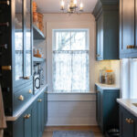 Purple painted kitchen cabinets.