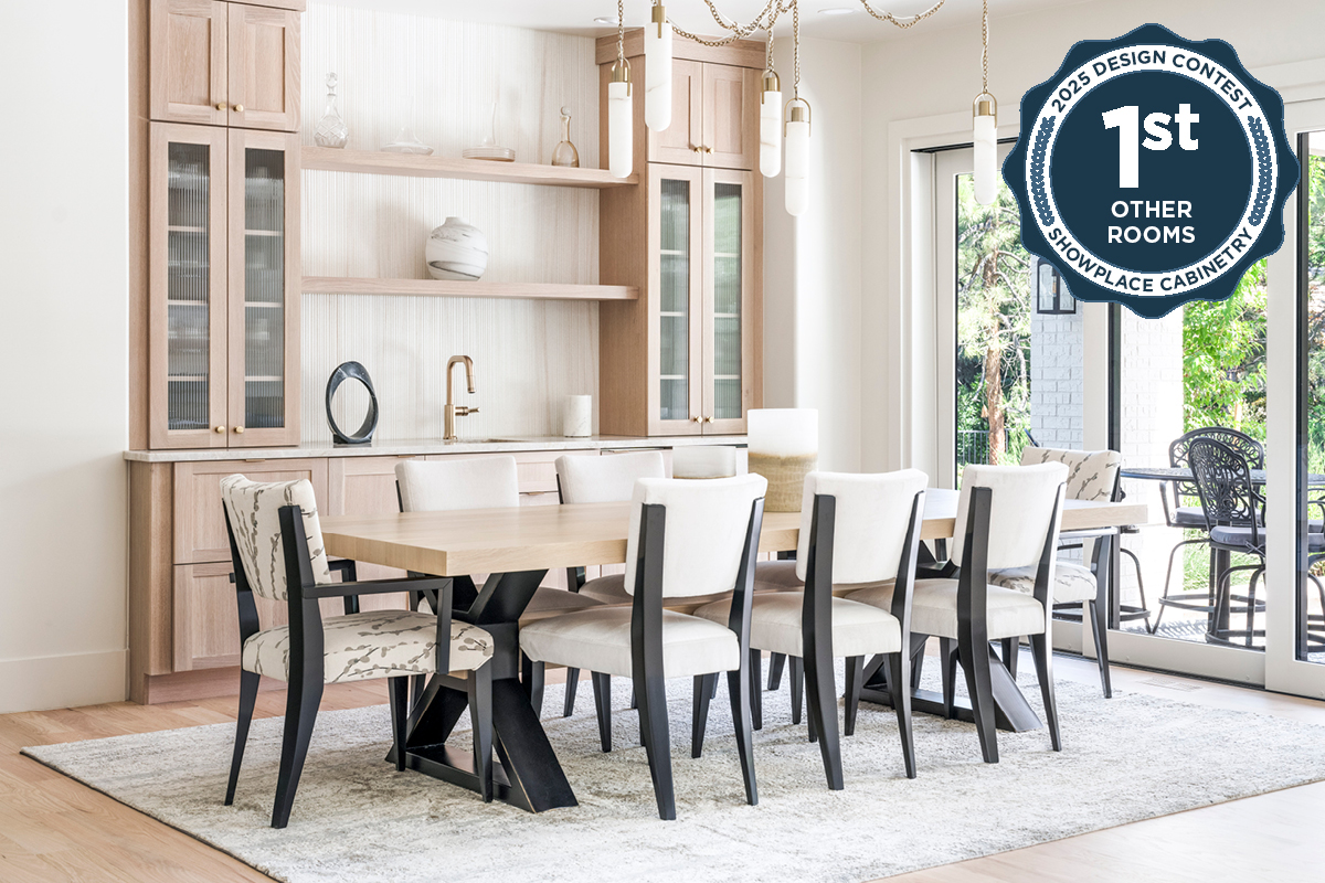 Light stained dining room serving station with table and chairs.