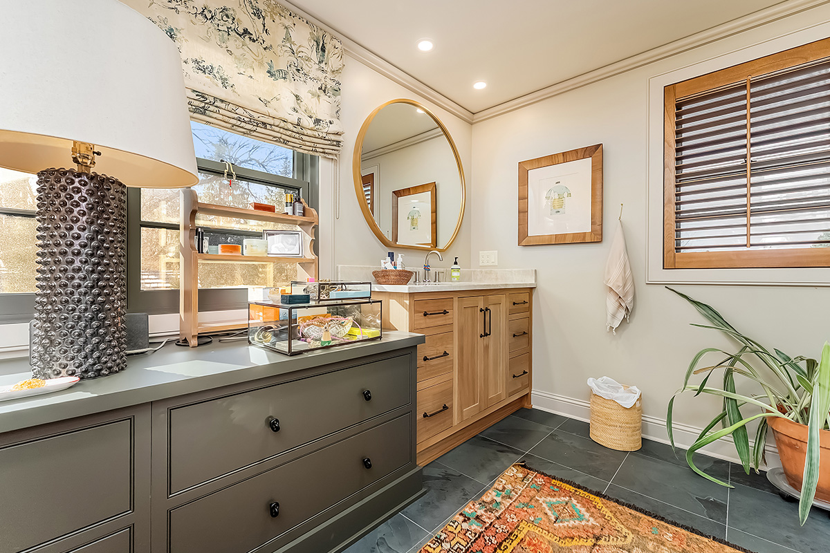 Stained and brown painted bathroom cabinets