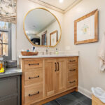 Stained and brown painted bathroom cabinets