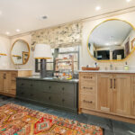 Stained and brown painted bathroom cabinets