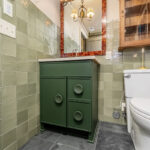 Green painted bathroom vanity