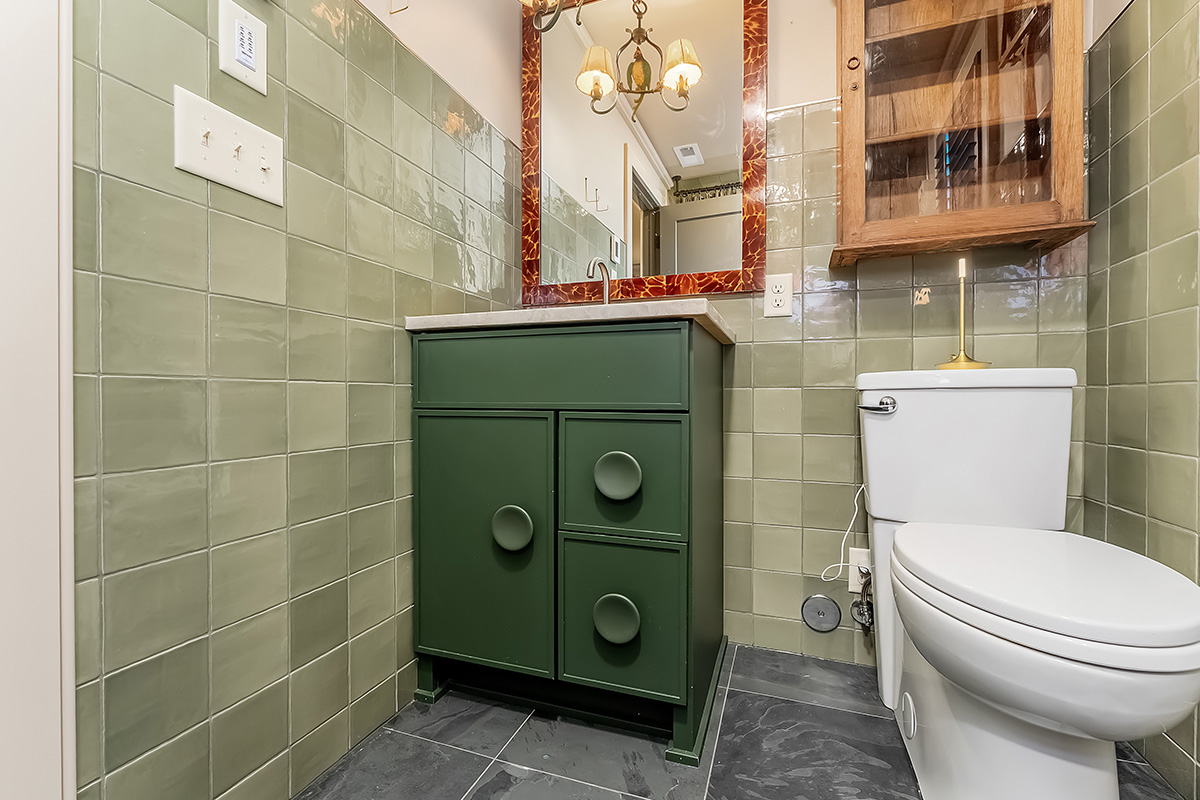 Green painted bathroom vanity