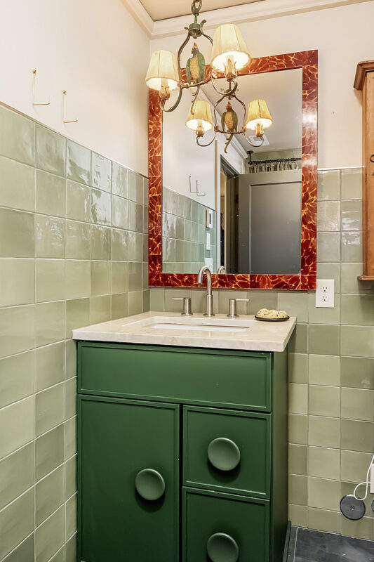 Green painted bathroom vanity