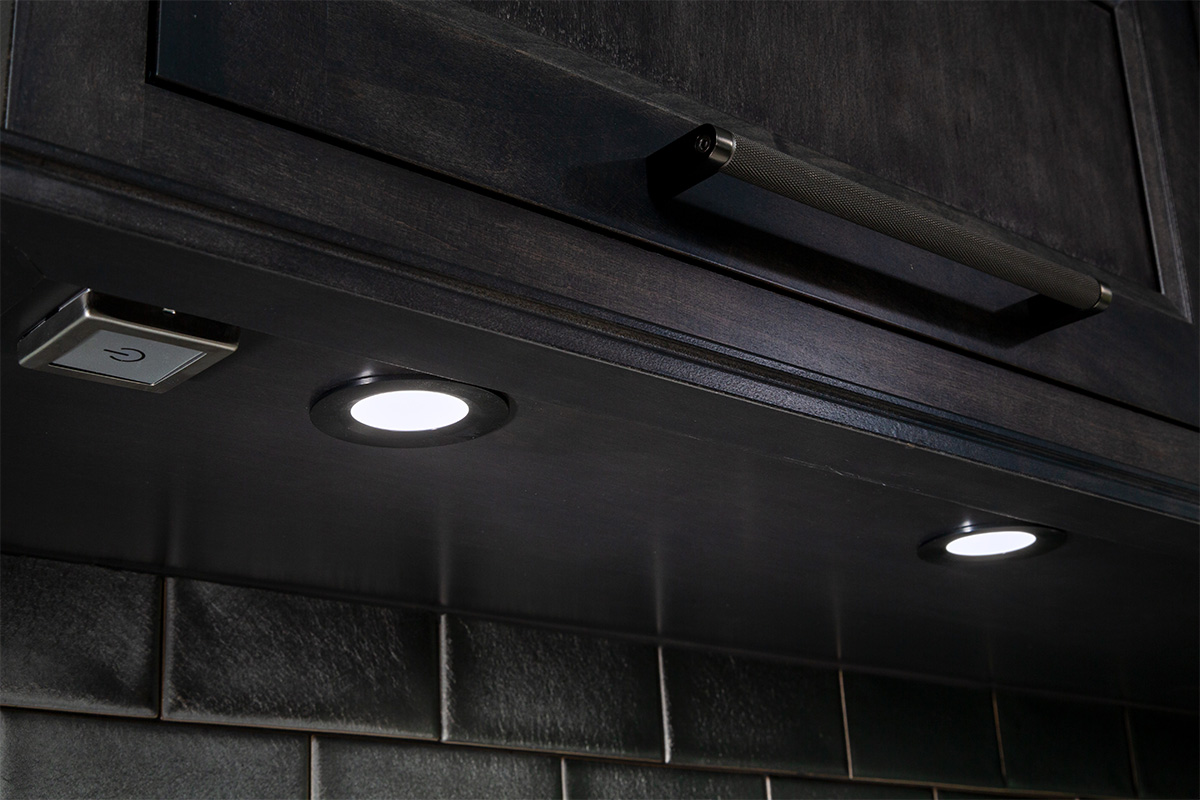 Dark stained bar cabinets with under-cabinet lighting