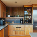 Natural hickory kitchen with black countertop