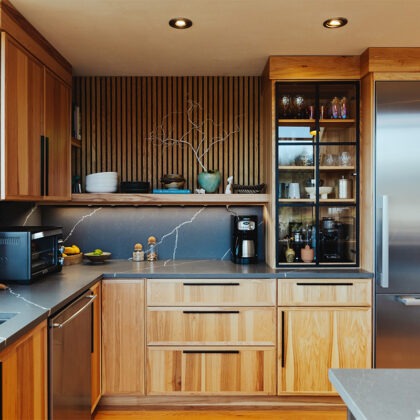 Natural hickory kitchen with black countertop