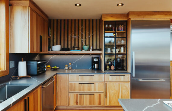 Natural hickory kitchen with black countertop