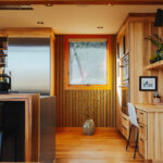 Natural hickory kitchen with black countertop