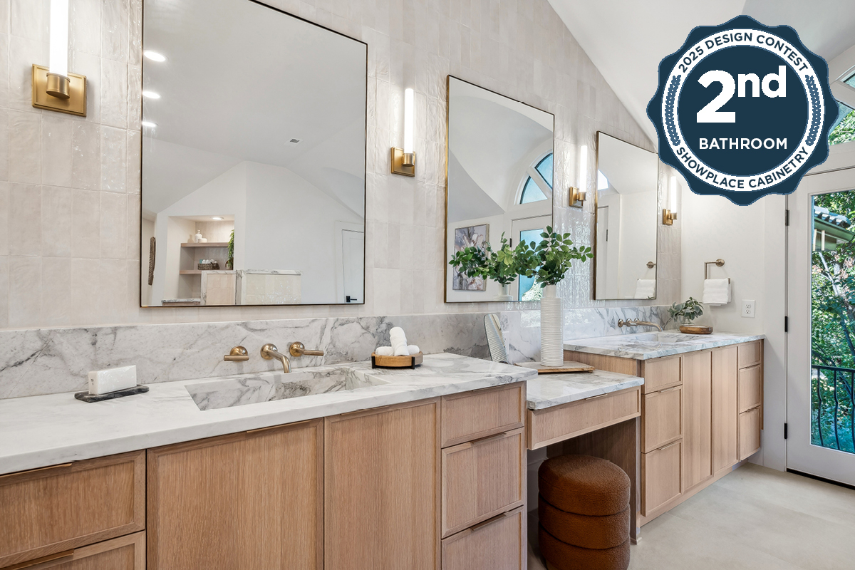 Double light brown bathroom vanities with powder desk in between.