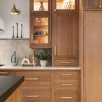 Stained white oak kitchen cabinets.