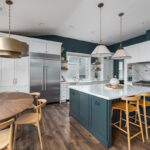 Blue and white kitchen with cabinets