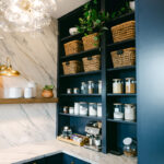 Blue and white kitchen with cabinets