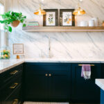 Blue and white kitchen with cabinets