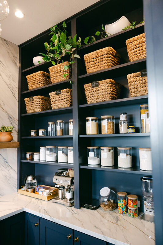 Blue and white kitchen with cabinets
