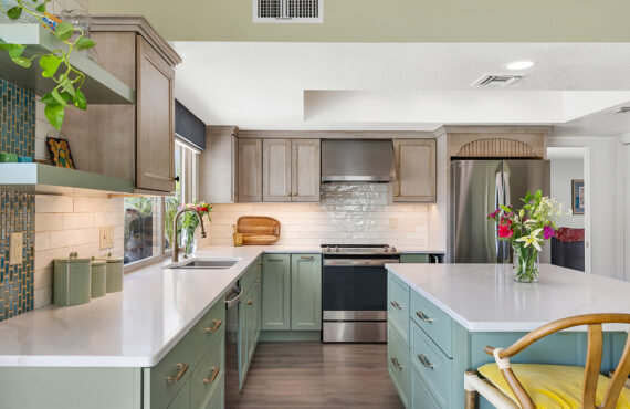 Light green and light brown stained kitchen