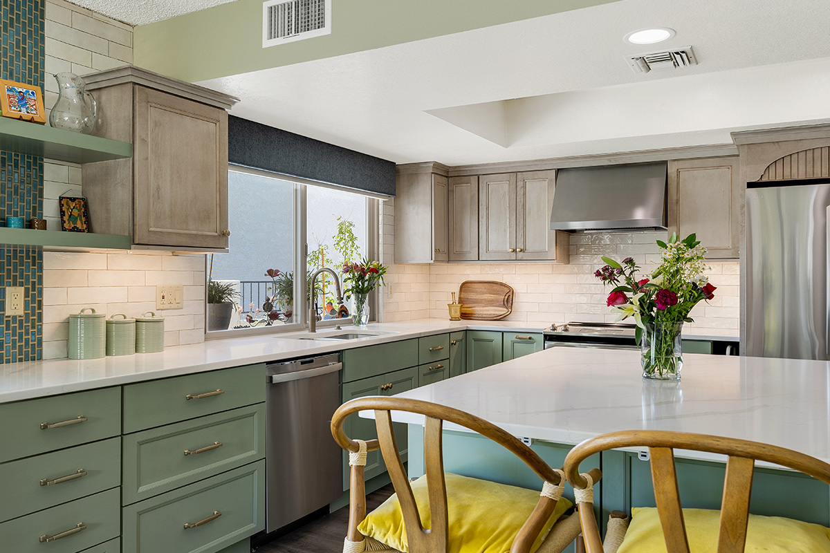 Light green and light brown stained kitchen