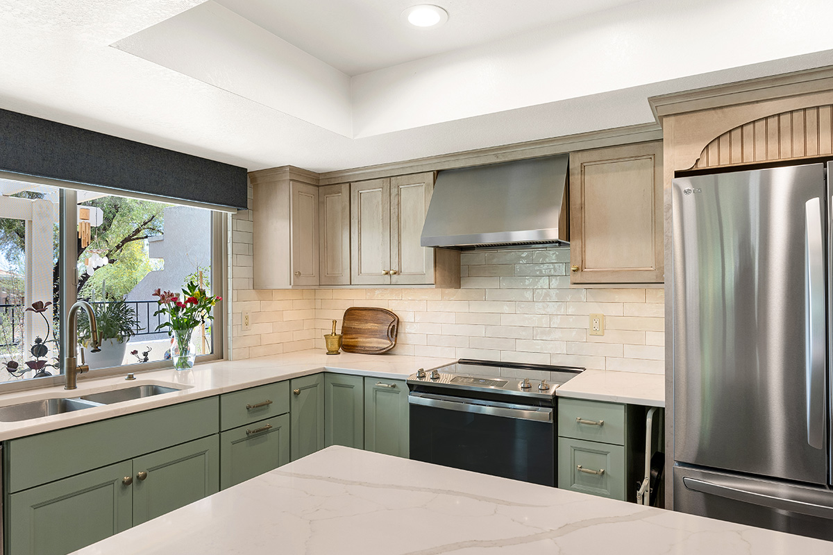 Light green and light brown stained kitchen