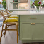 Light green and light brown stained kitchen