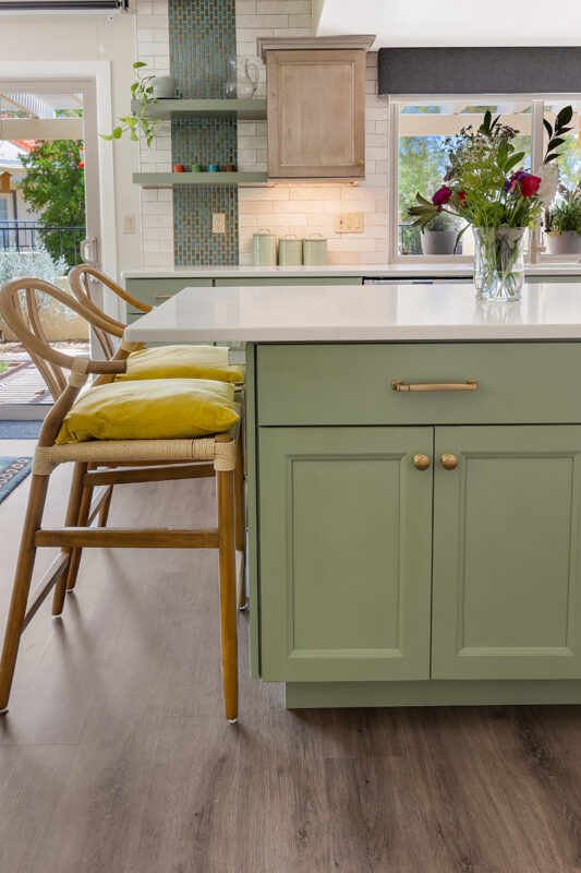 Light green and light brown stained kitchen